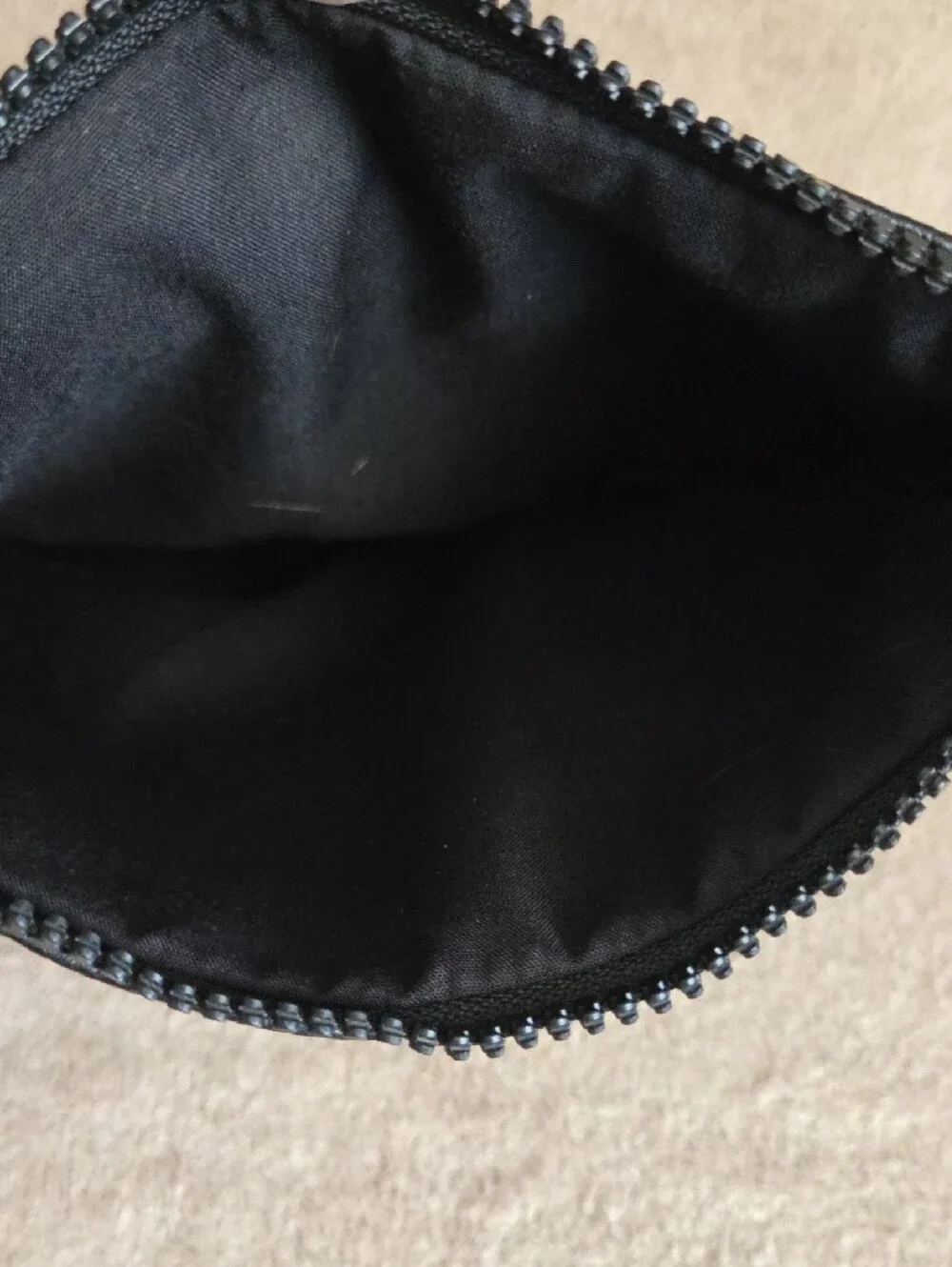 NUDESTIX Black Cosmetic Pouch with Playful Patches